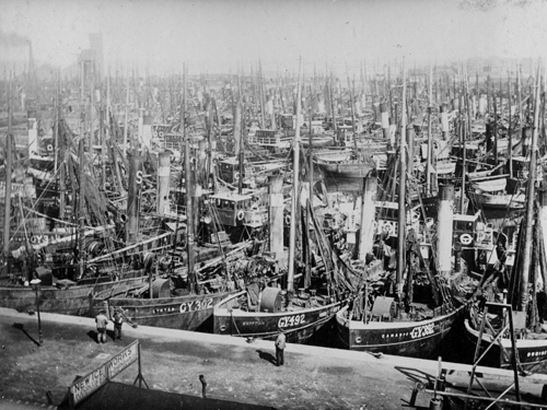 Historic crowded fishing harbour in Grimsby