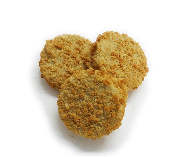 Three golden crumb-coated fish cakes